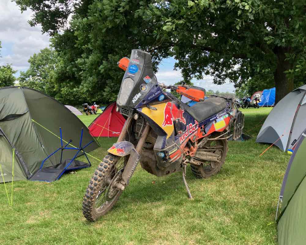 The Ollie Moto Batbike parked at a campsite during the ABR Festival 2022.