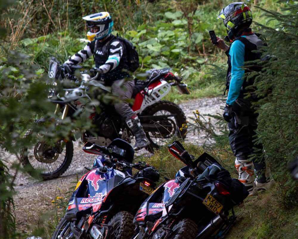 Blog: AS Wales 3. Ollie Moto doing some filming with 2 990's laying on the ground.