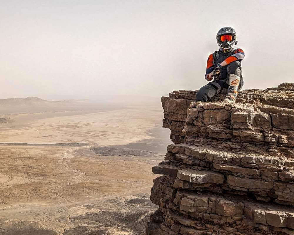 Blog: Shoulder 2. Ollie Moto posing on top of the Pol Tarres rocks in Morocco.
