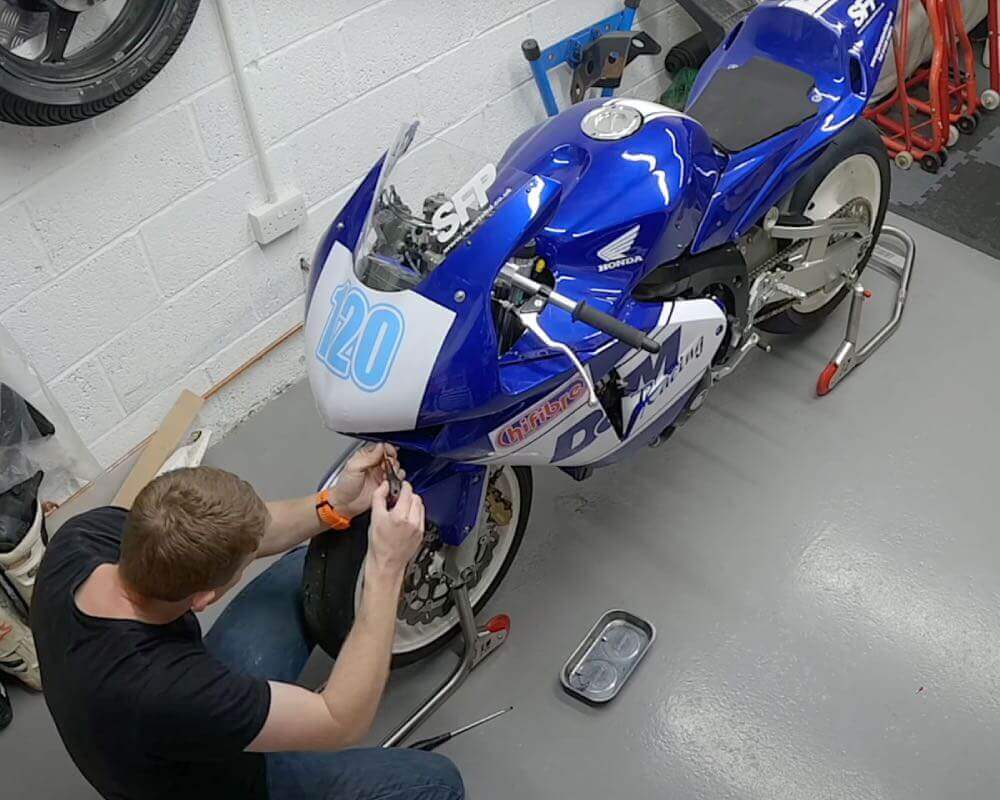 Blog: Track bike 2. Ollie Moto carrying out maintenance on his CBR600RR track bike.