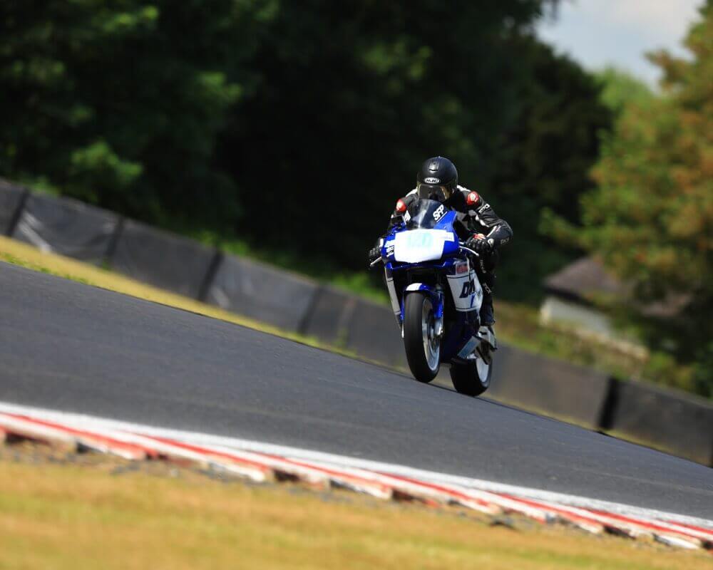 Blog: Track bike 3. Ollie Moto on his track bike racing down the straight at Oulton Park