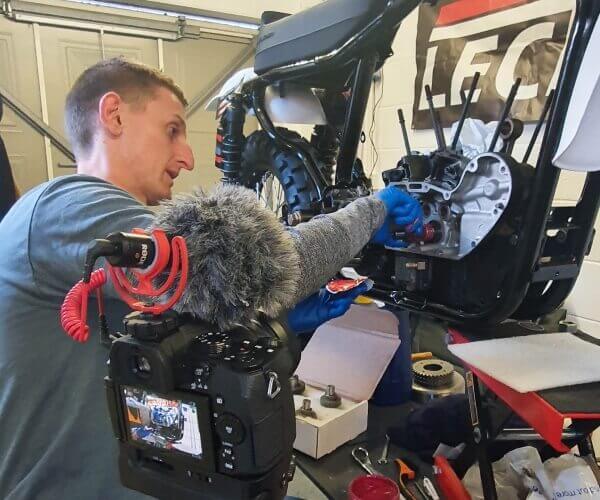 Ollie Moto filming and doing maintenance during the Full HD project.